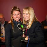 Tammy Lindrum presenting Anna Lynch with the winner's trophy for the 2019 World Women's Billiards Championship