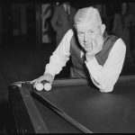 Walter Lindrum performing trick shots of billiards