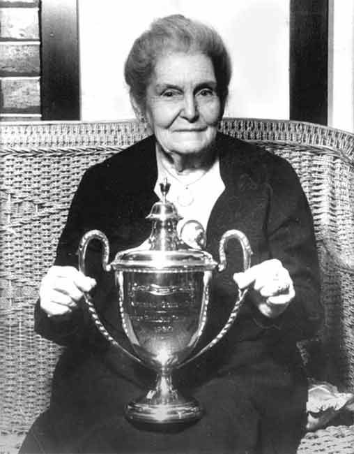 Walter Lindrum's mother, holding the Gold Cup Trophy