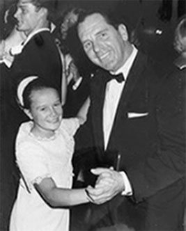 Young Tammy Lindrum dancing with Uncle Bill Ellis