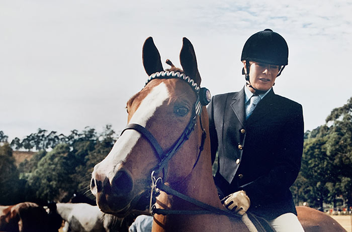 Tammy at an equestrian competition in Queensland, her team winning first place in the Rider event, and overall Reserve Champion